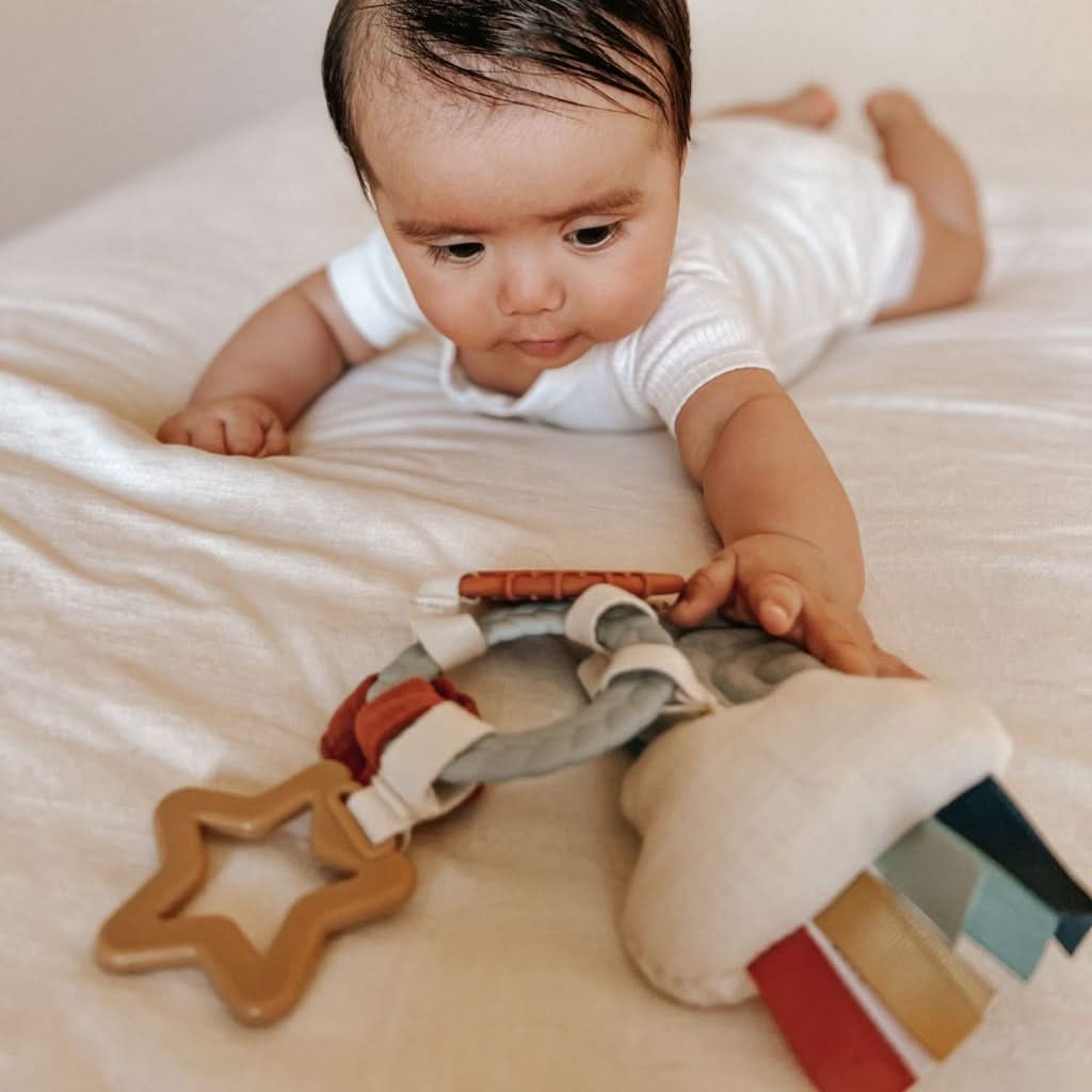 Bitzy Busy Ring™ Teething Activity Toy - Image 23